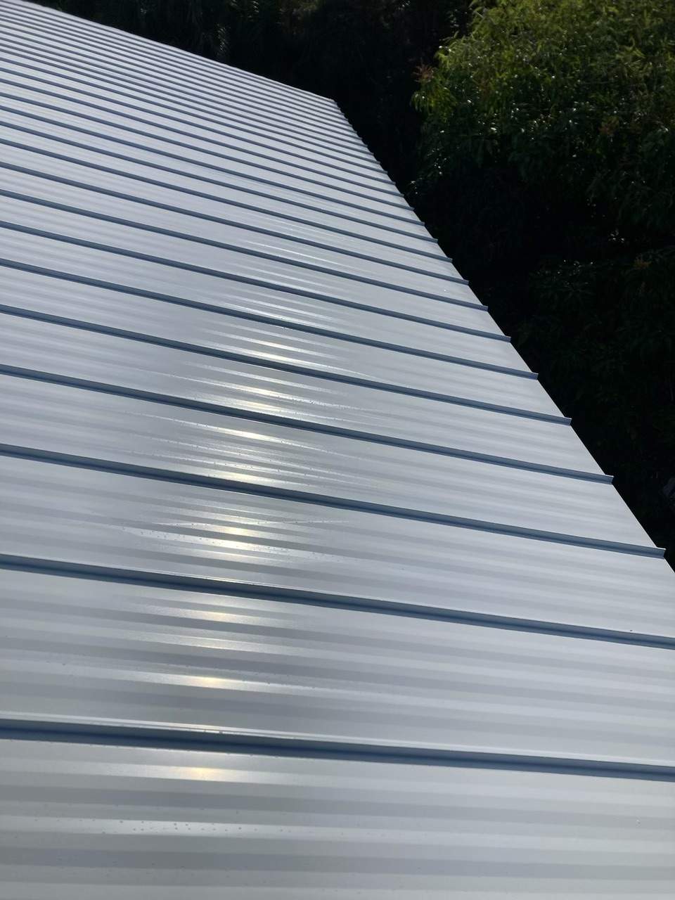 Residential Roofing Installation using Gulf Coast Metals Gulf Seam Panels by Four Peaks Roofing
