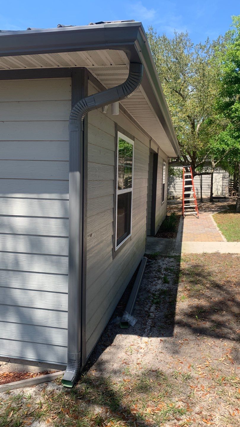 Gutter Installation Using Charcoal Grey K-Style Seamless Aluminum Gutters by Gutter Professors