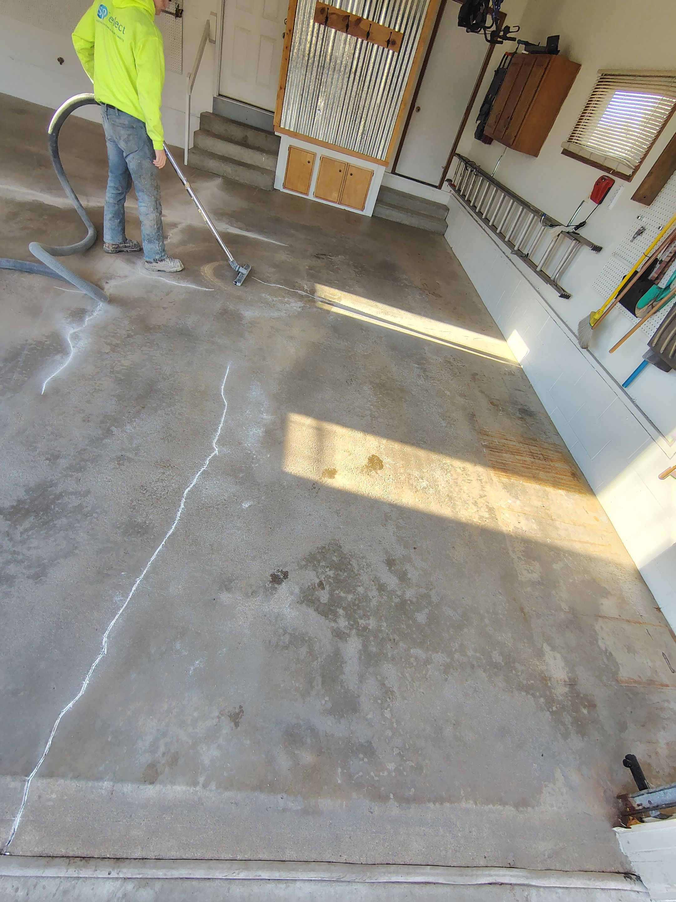Multi-Colored Flake Epoxy Garage Floor Coating and Crack Repair by Select Painting, Coatings & Garage Cabinets