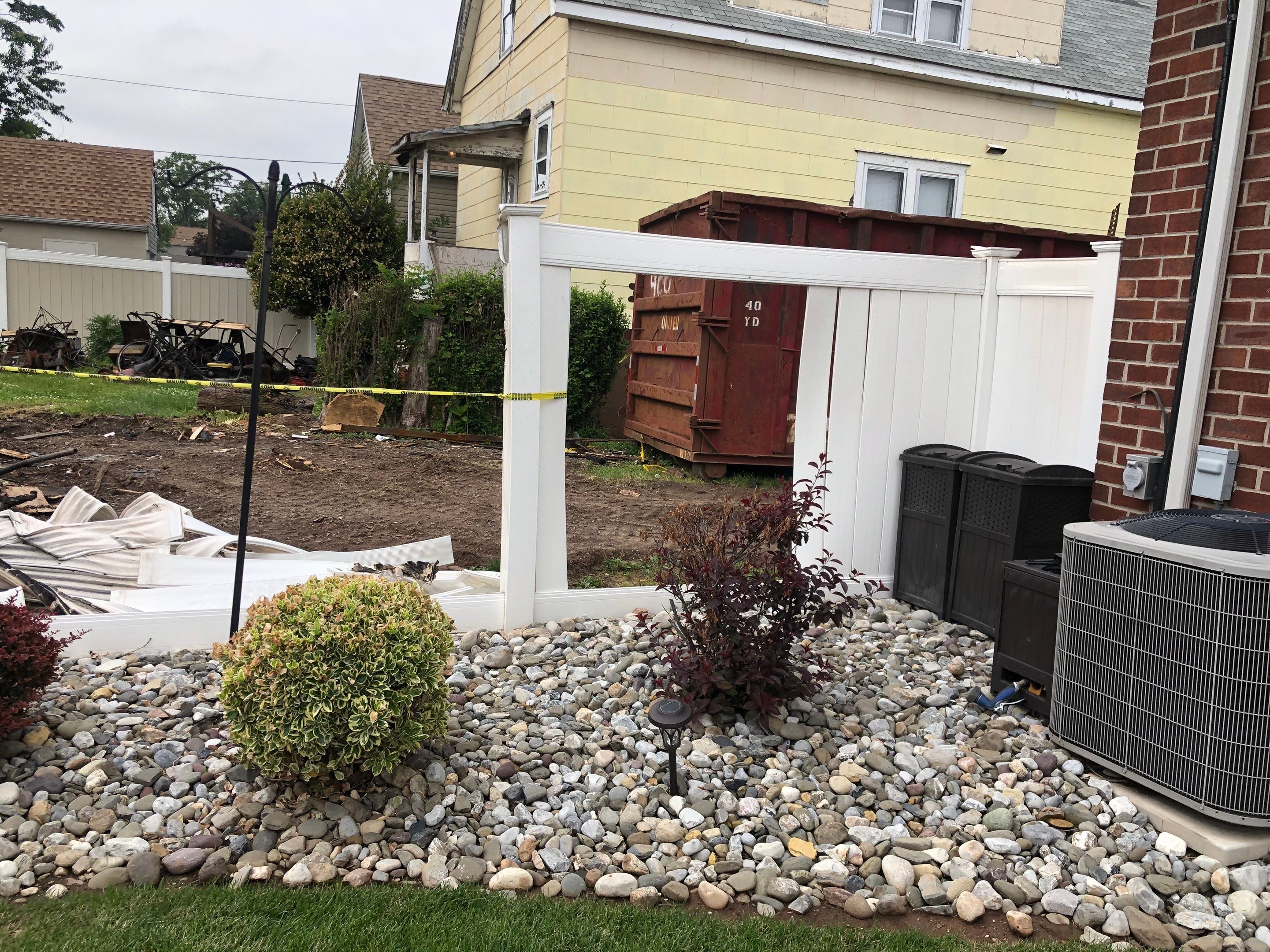 Fence Installation using White Fence by Home Concepts Construction