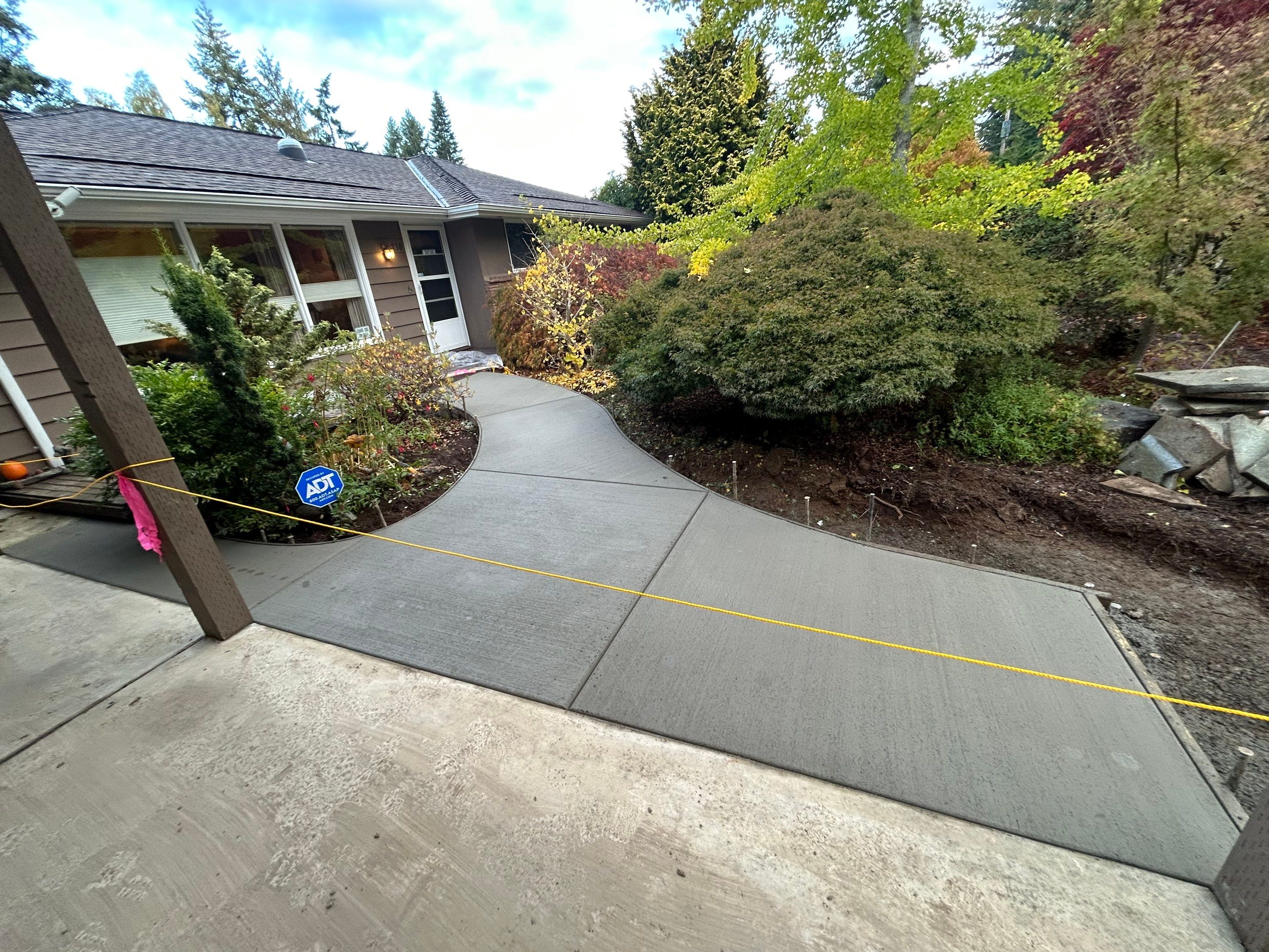 Edie | Concrete Driveway and Walkway  by Jireh Asphalt & Concrete Inc 