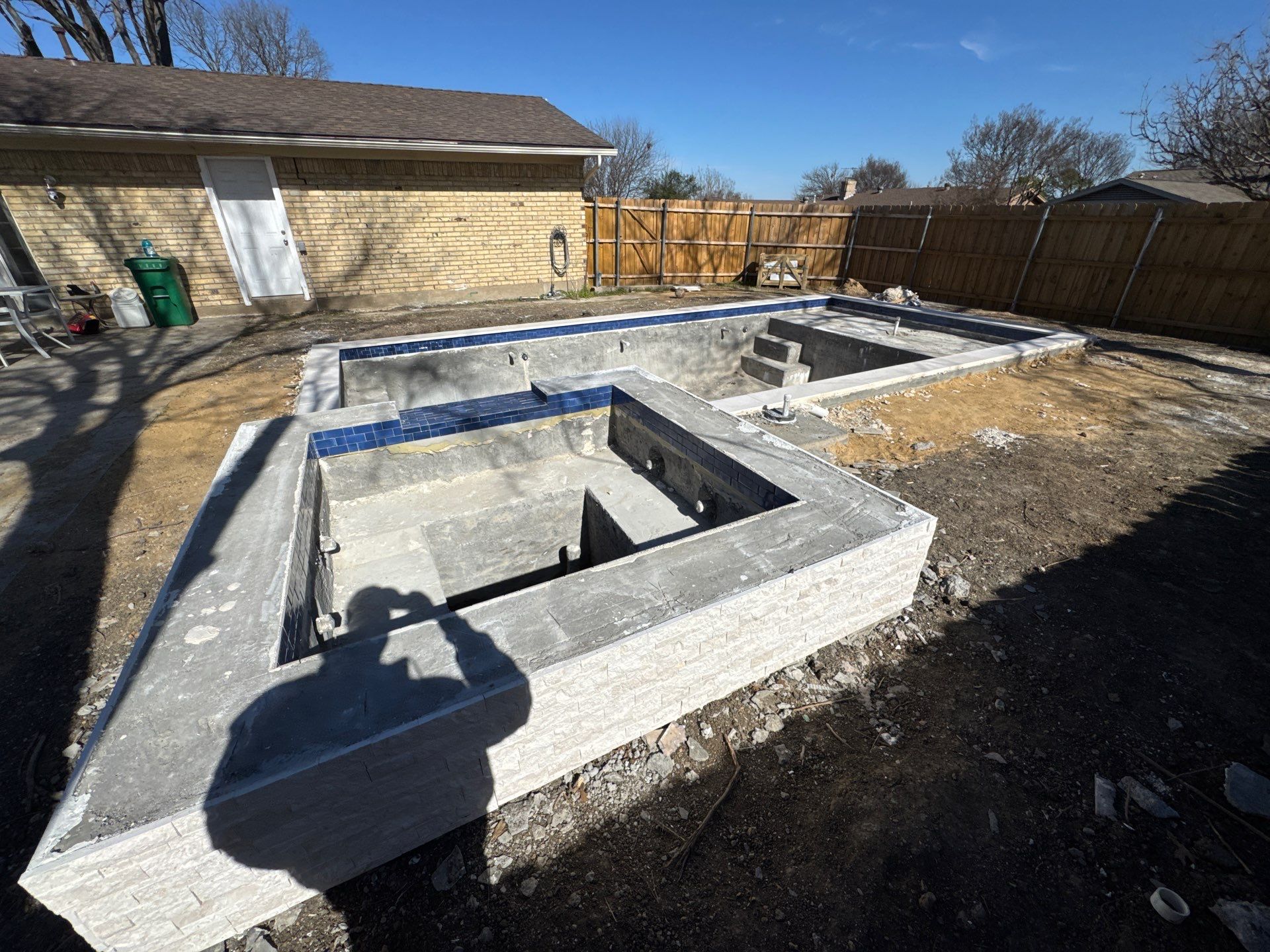 Modern Geometric Pool with Spa and Sheer Descent Water Wall by Pinnacle Pools and Spas - DFW