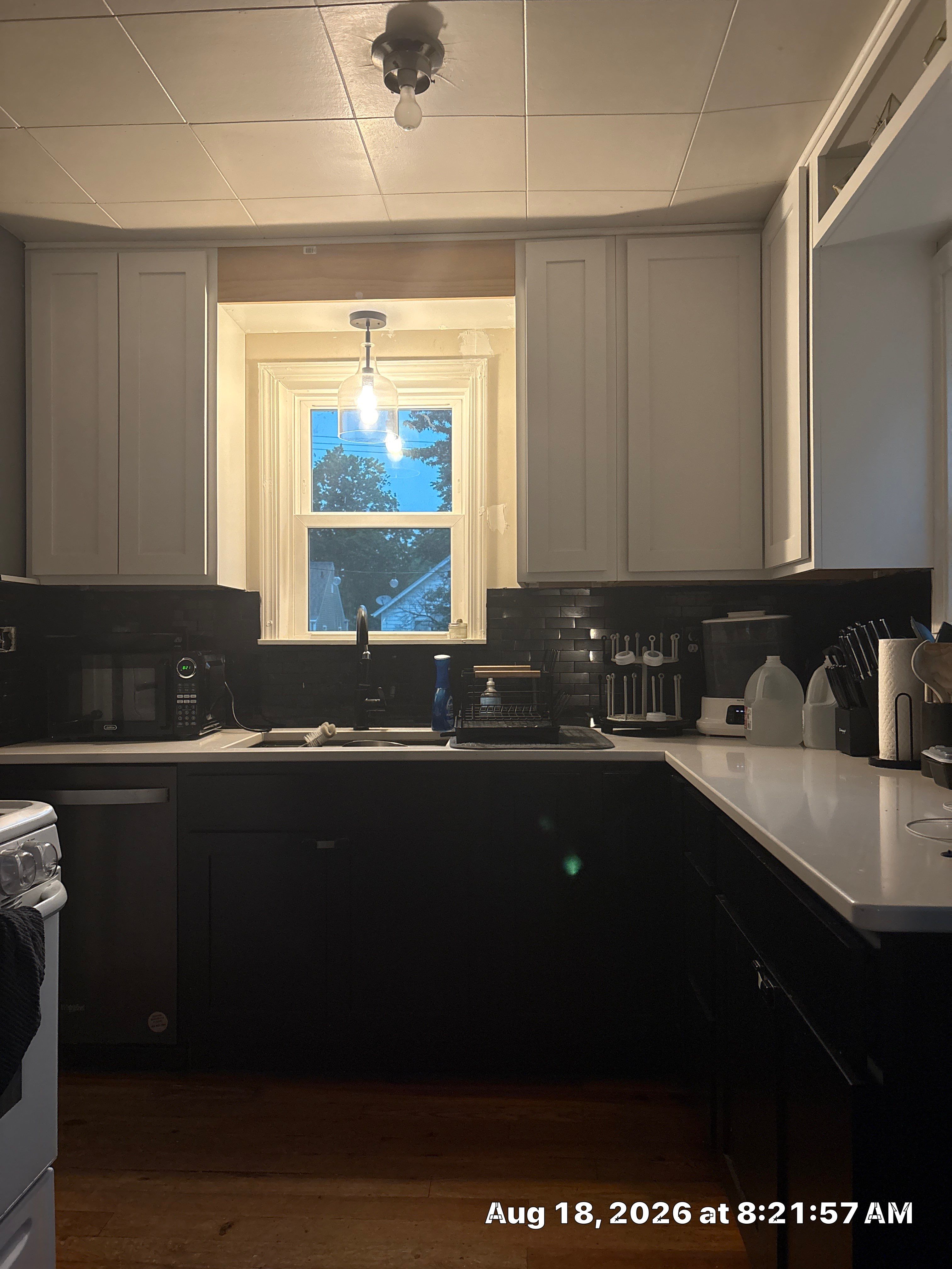 Lincoln Kitchen Renovation Featuring Black and White Shaker Cabinetry by CompanyCam Sales Demo
