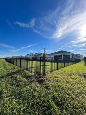 Aluminum Fence Installation using Black 3 Rail Aluminum Fence