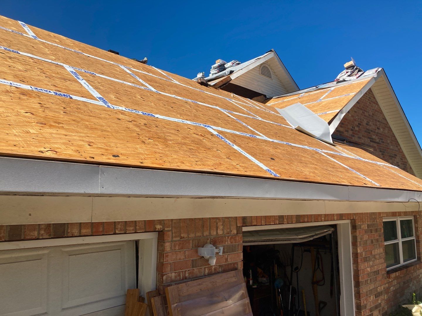 Residential Roofing Installation using Roof Replacement by American Roofing & Construction LLC