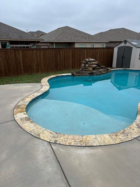 Freeform Pool with Raised Spa and Stone Coping by Pinnacle Pools and Spas - DFW