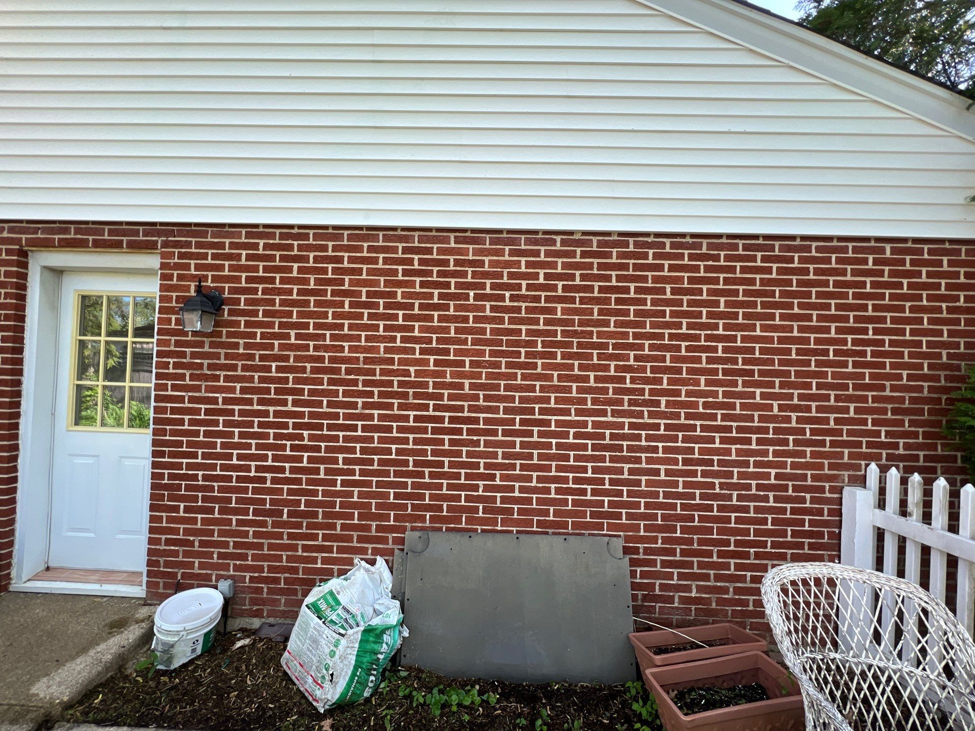 Housewashing  using Algaecide, soft wash soap by Northern Power Washing LLC.