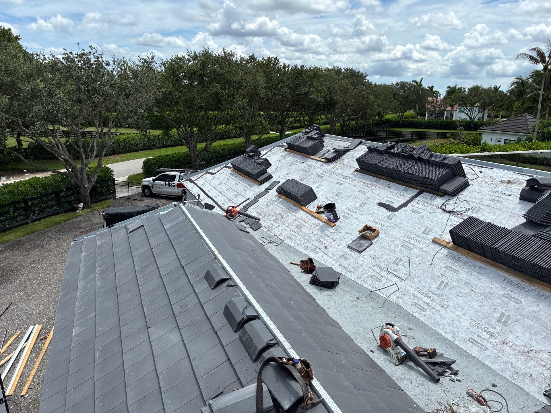3612 Aiken Ct. Wellington FL - Westlake Newpoint Saxony 900 Slate - Charcoal Grey by Total Roofing System The Metal Roof Experts