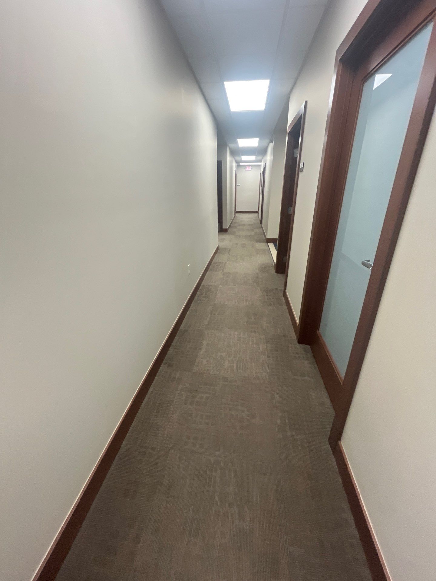 Commercial Office Interior Remodel and Modern Suite Refresh in Sioux Falls by Select Painting, Coatings & Garage Cabinets