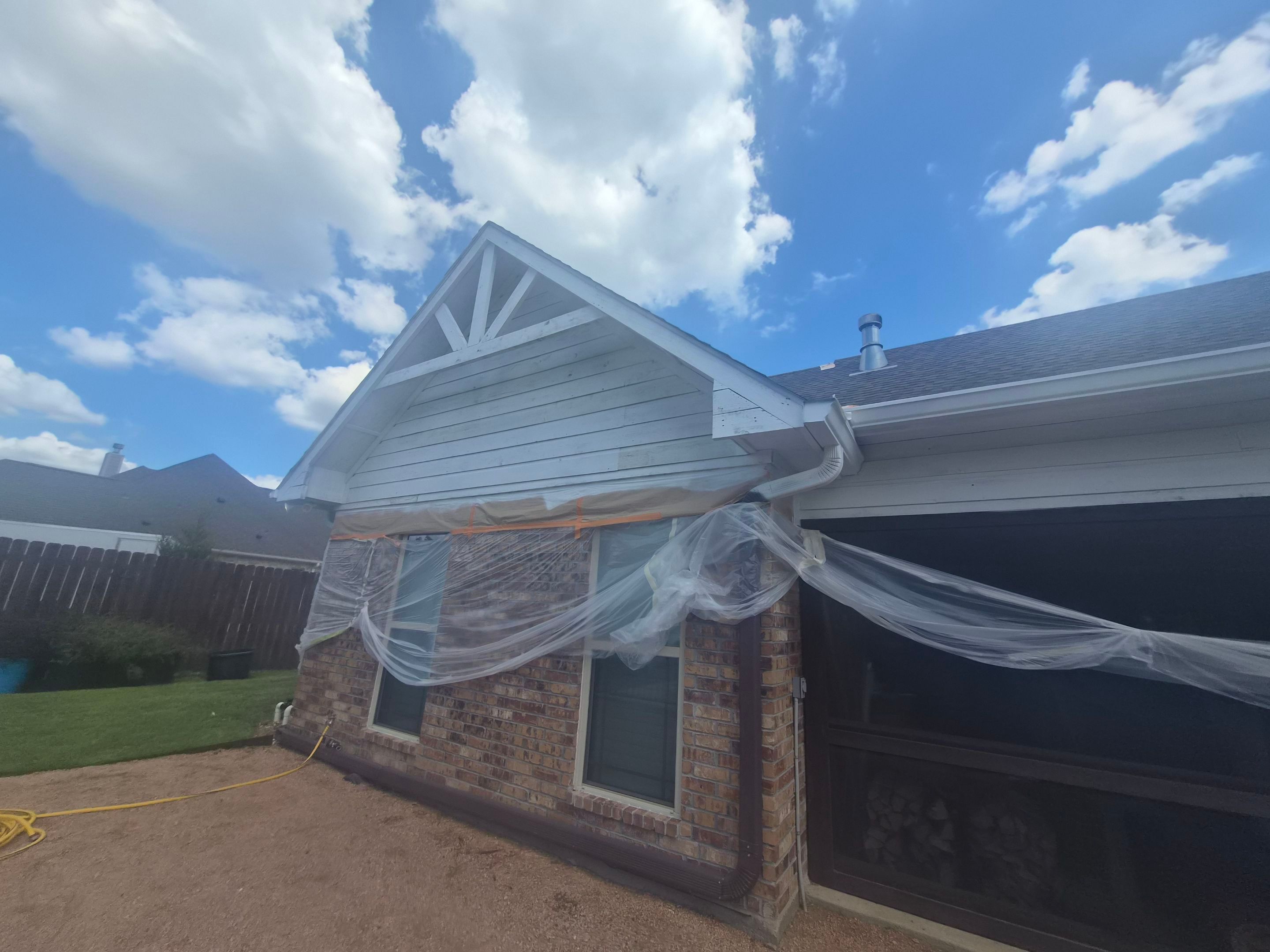 From Dated Brown to Modern Contrast: A Mineola Exterior Transformation by Quality Coats Painting