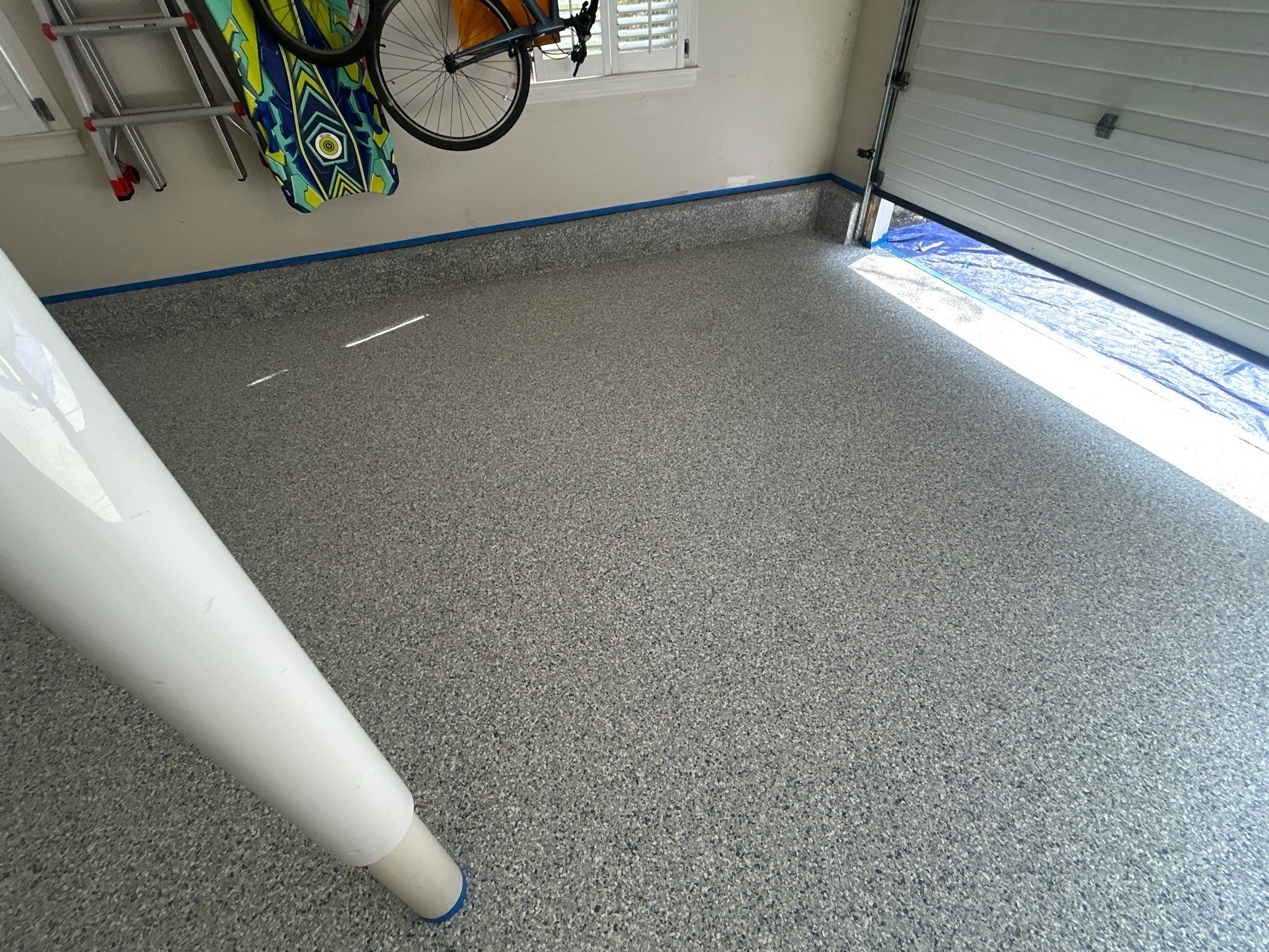 Concrete Floor Coating Transformation by DiGiorgi Roofing and Siding Inc
