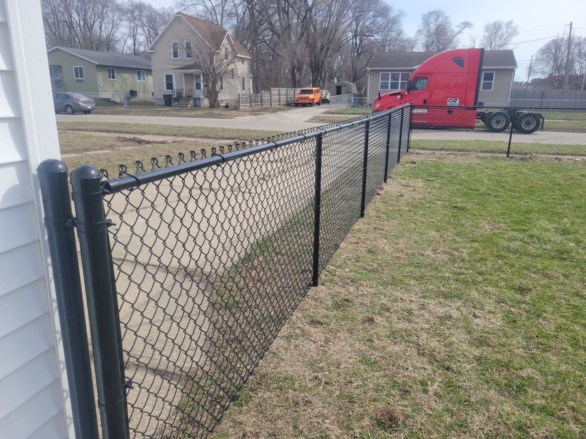 Black Chain Link Fence and Gate Installation in Waterloo by Perfect Picket Fence and Stain