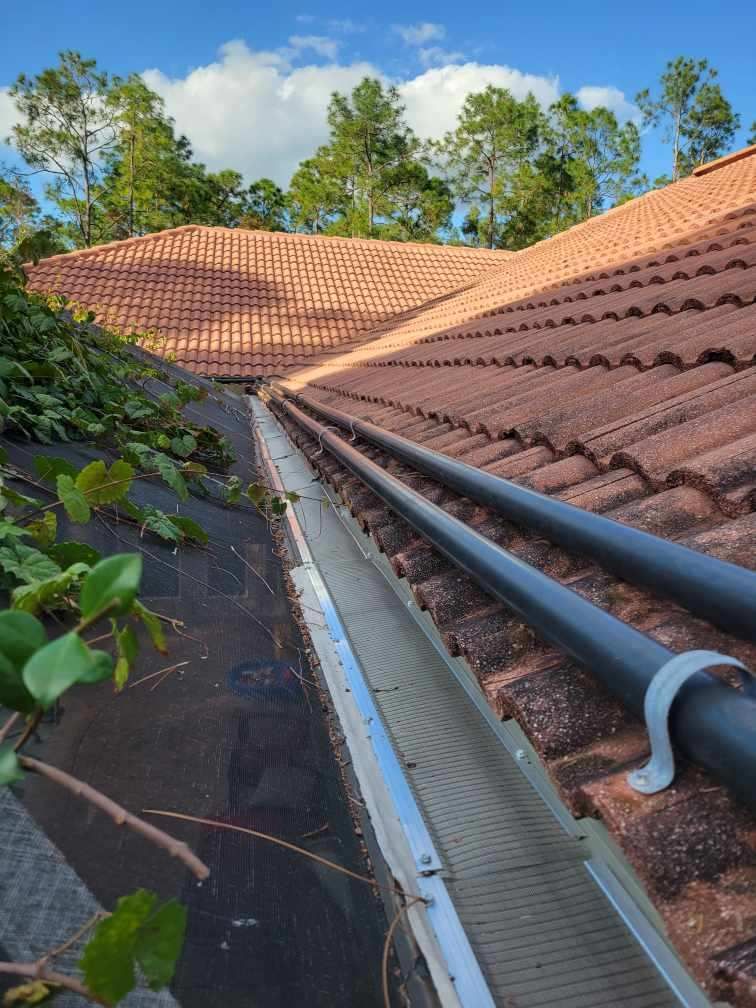 New Splash Guards and 6-Inch seamless Gutters in Naples FL by Gutter Professors