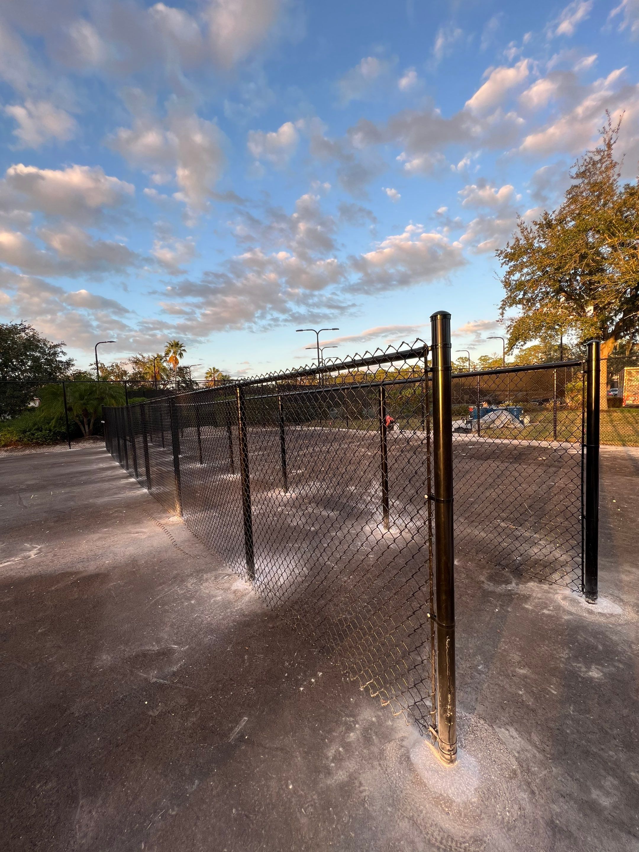 Chain-link Fence Installation using 8Ft Tall Black Chainlink Fence by Asap fence and gates, LLC