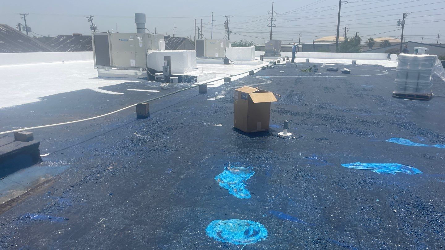 Dirty leaking Gravel Roof by Bayfront Roofing and Construction