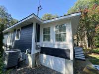 Siding Installation using JH Cedar Mill Plank by ExteriorPros