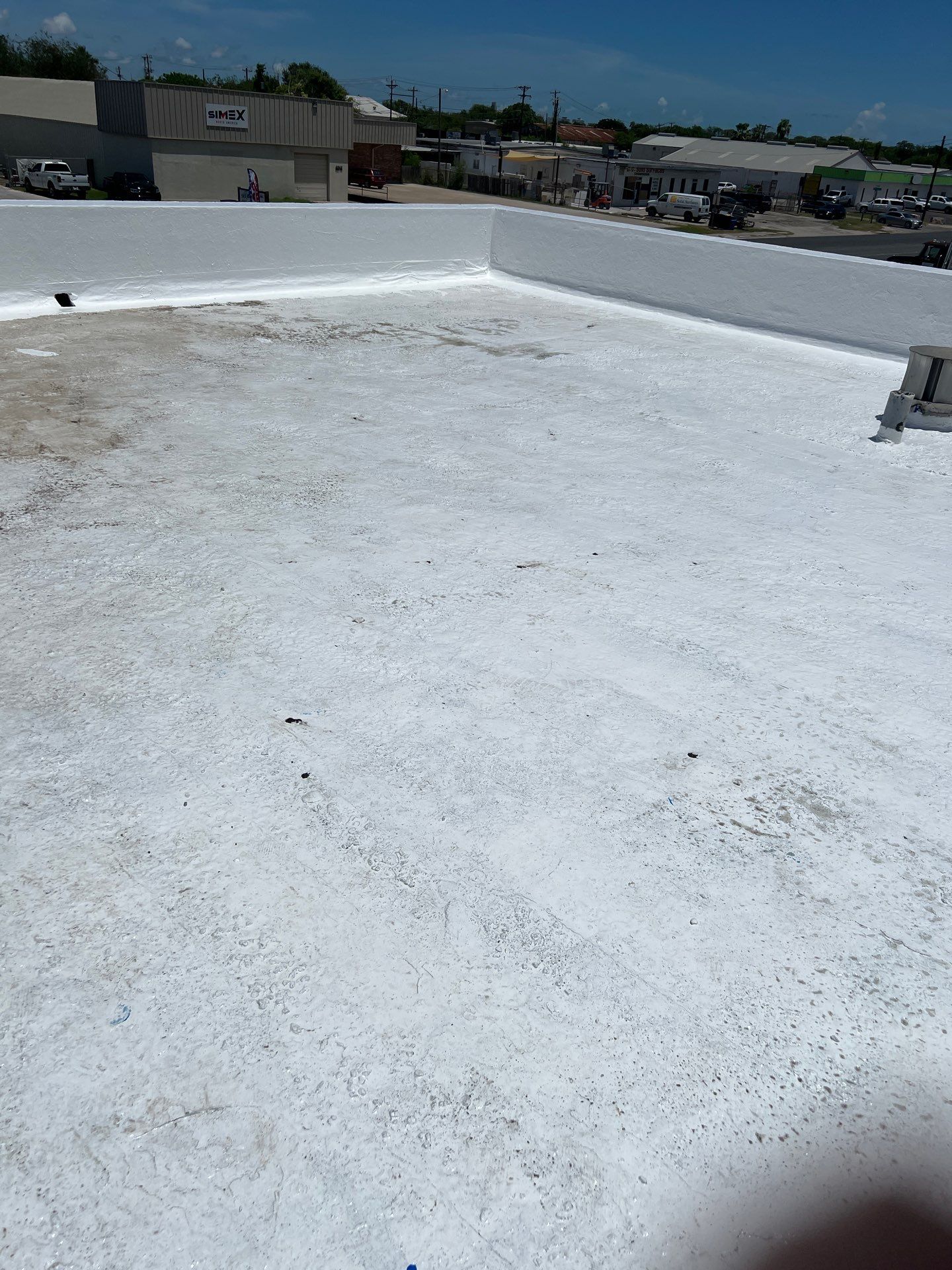 Dirty leaking Gravel Roof by Bayfront Roofing and Construction