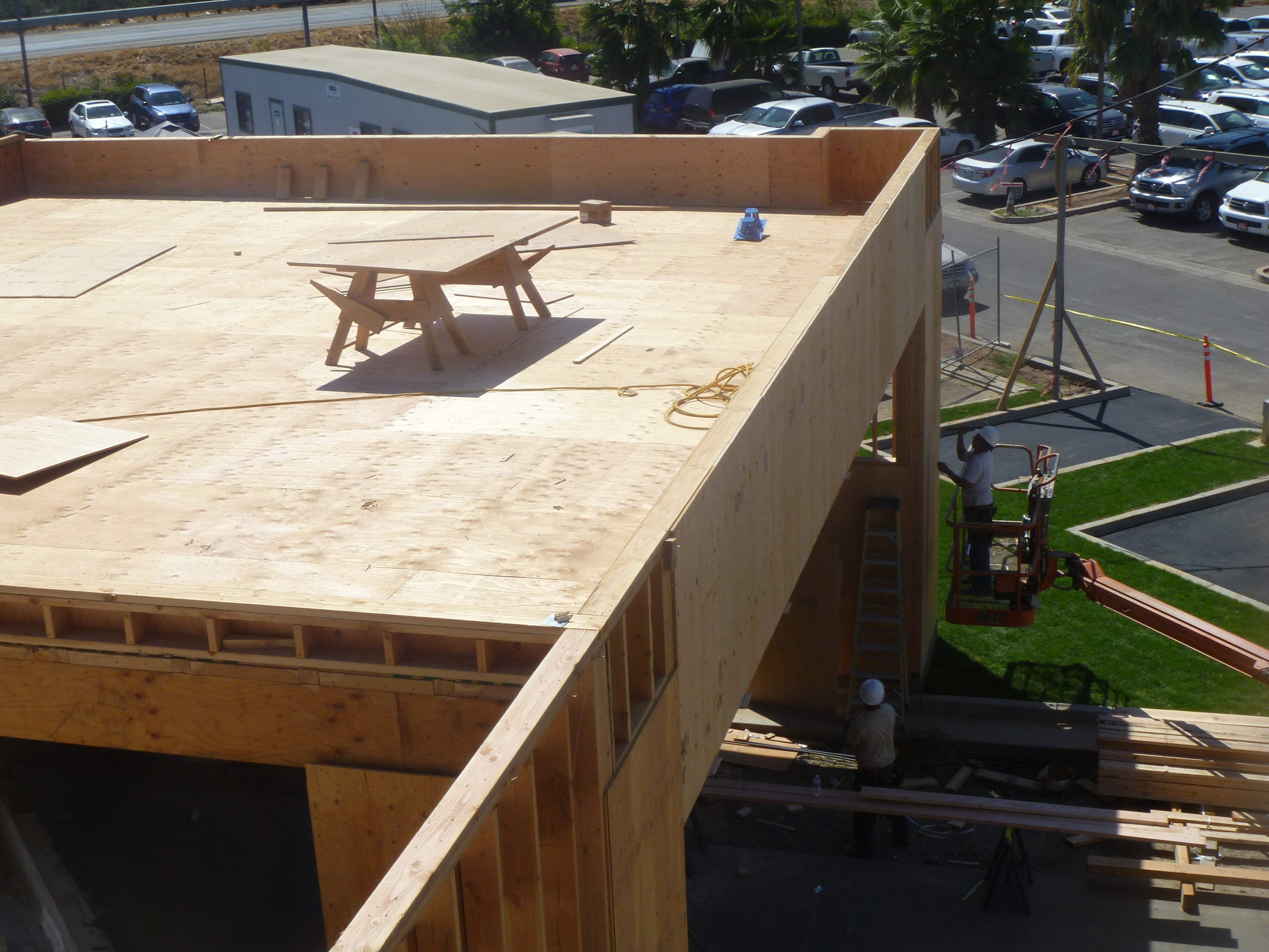 Commercial Roofing Installation using Spray foam and Conklin Benchmark/PUMA XL 18 yr warranty coatings by Straight Edge Roofing Inc