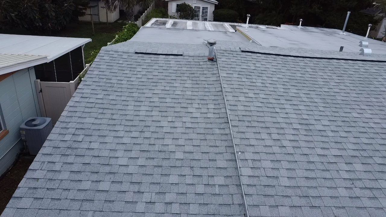 Shingle Reroof Replacement New Smyrna Beach FL by Pinnacle Roofing Group