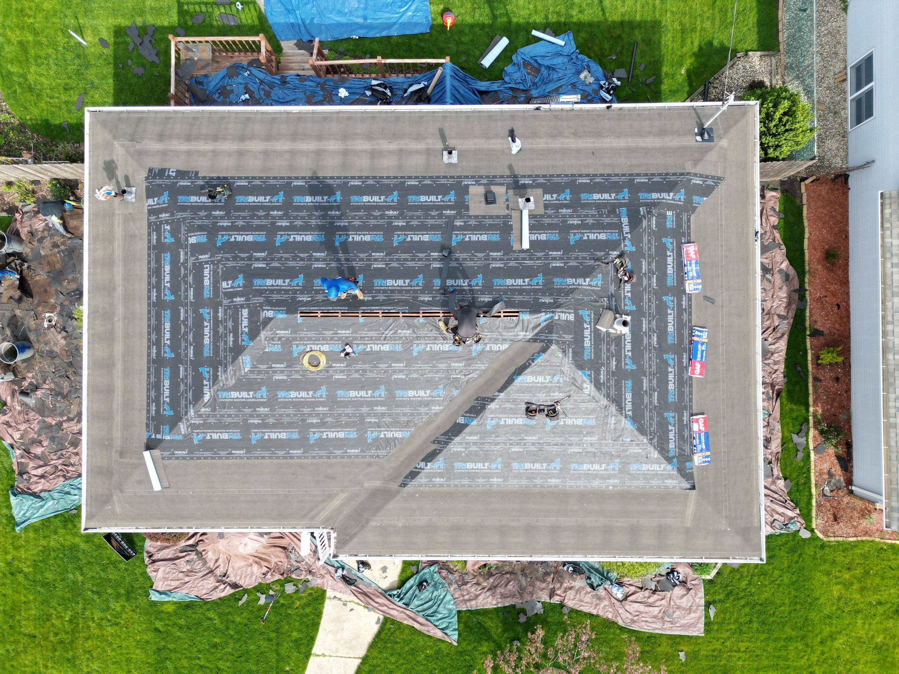 House and garage roof replacement by Optimal Home Improvement 