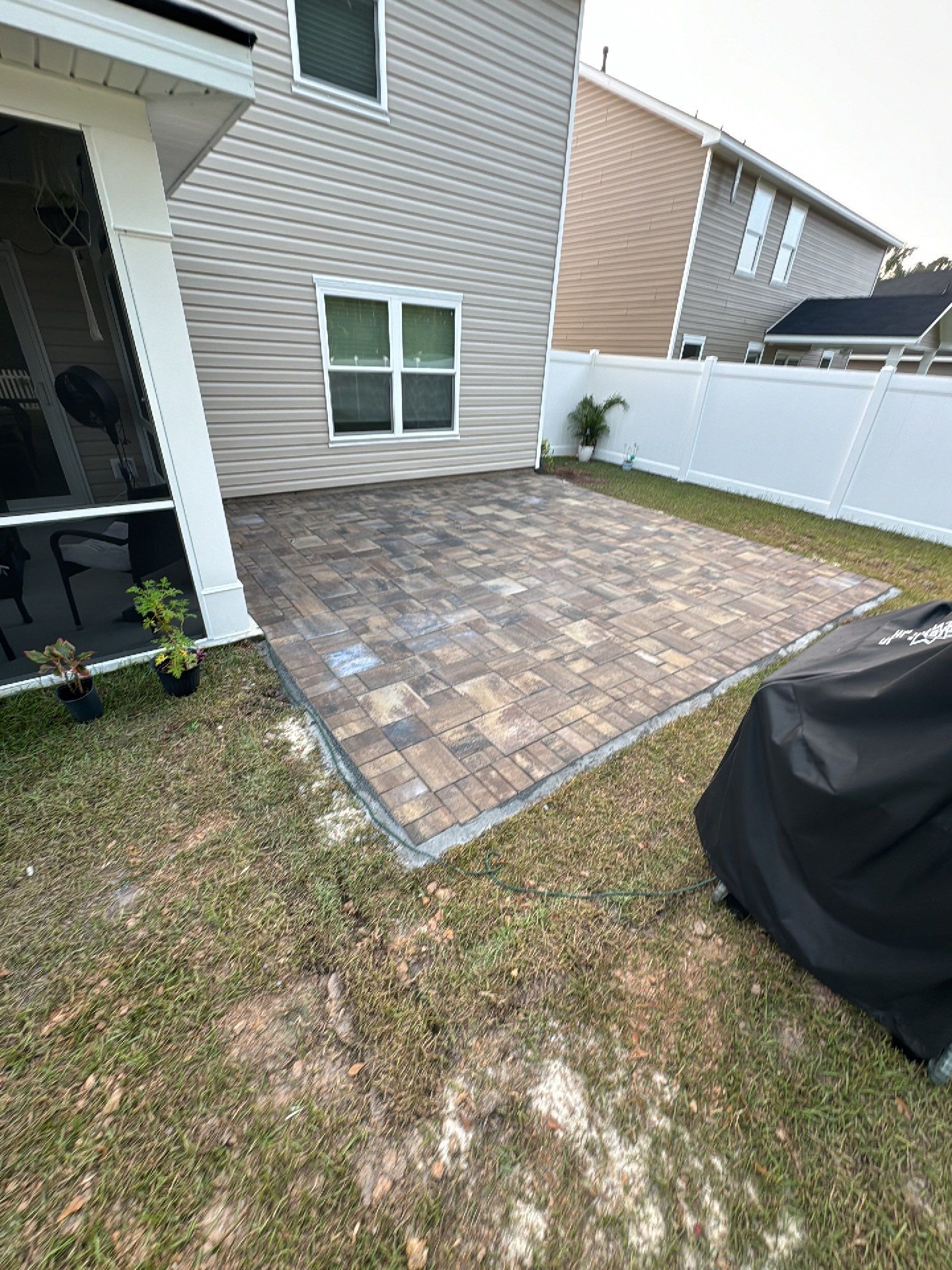 Custom Multi-Toned Paver Patio Installation in Bluffton by Lowcountry Scapes, LLC