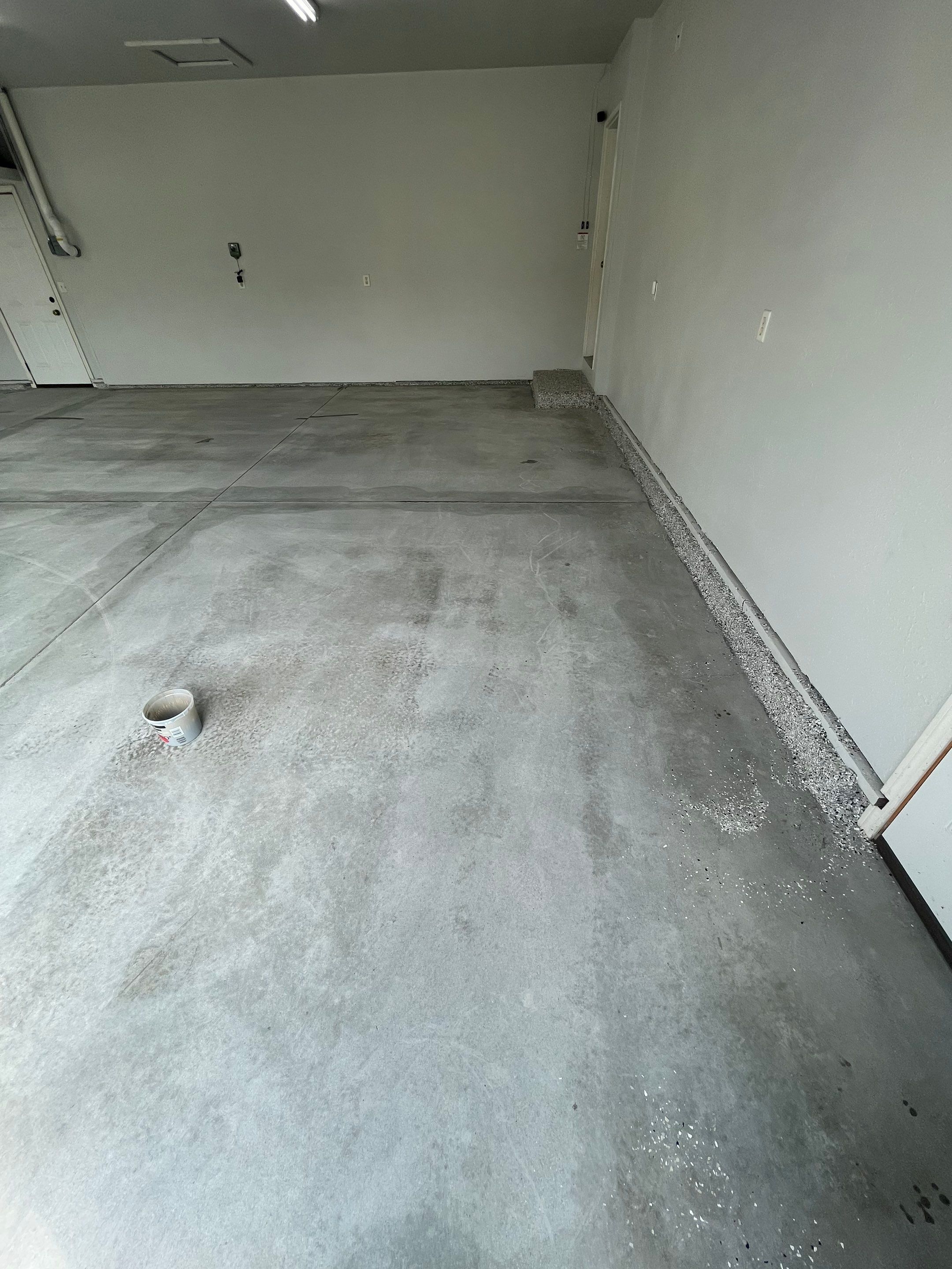 Multi-Car Garage Floor Coating and Crack Repair in Tea by Select Painting, Coatings & Garage Cabinets