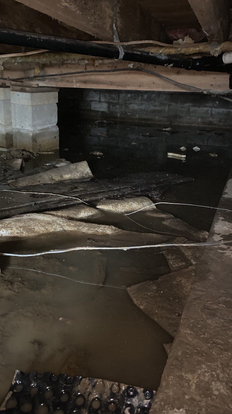 Crawl space encapsulation and Waterproofing using GrateDrain Waterproofing System by Toledo Basement Repair 