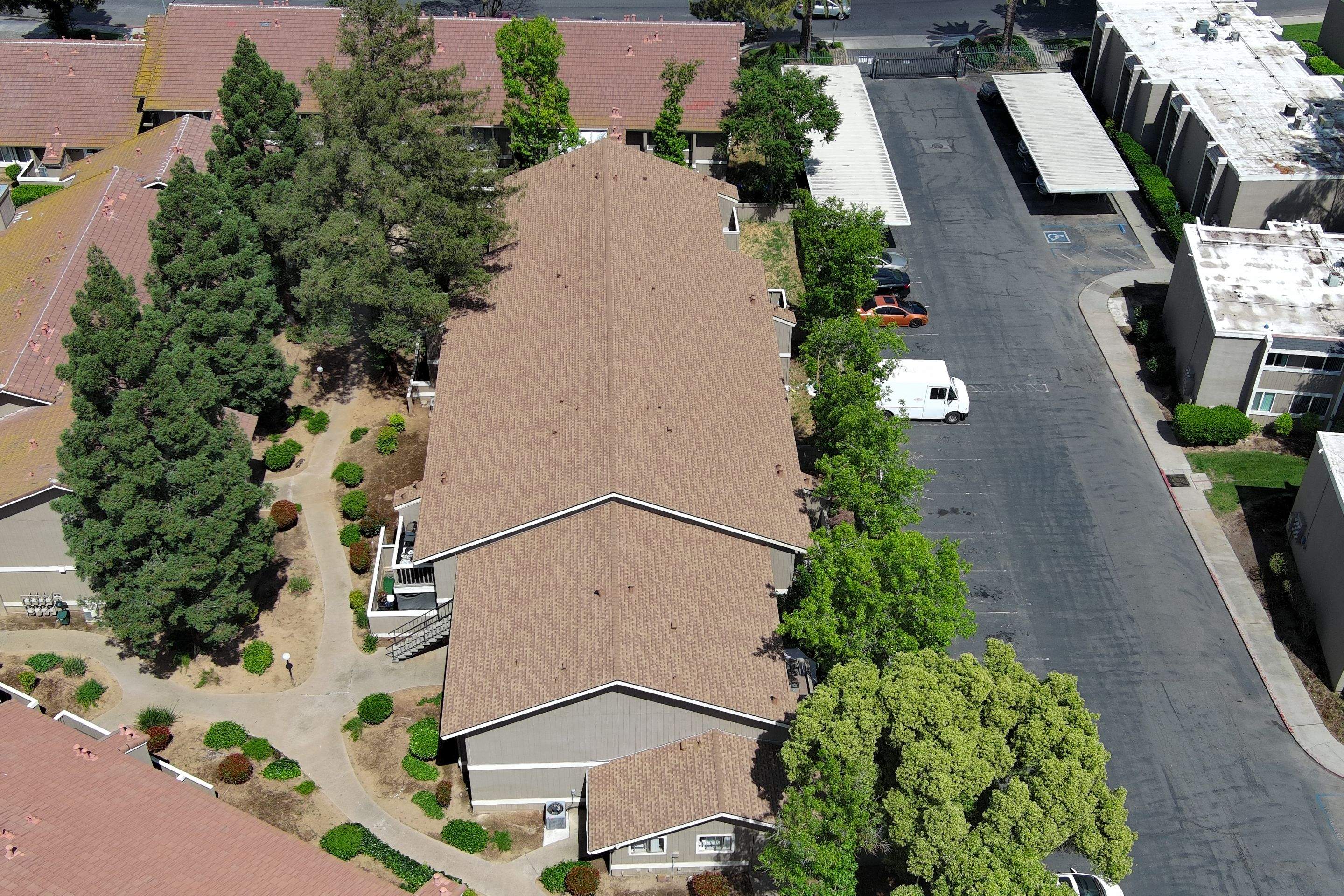Removed tile from roof and replaced with shingles by Straight Edge Roofing Inc