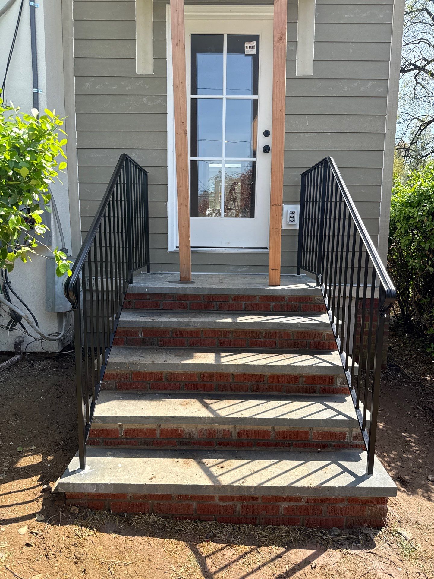 Custom Brick Step and Metal Railing Installation in Silver Spring by Capitol Iron Works