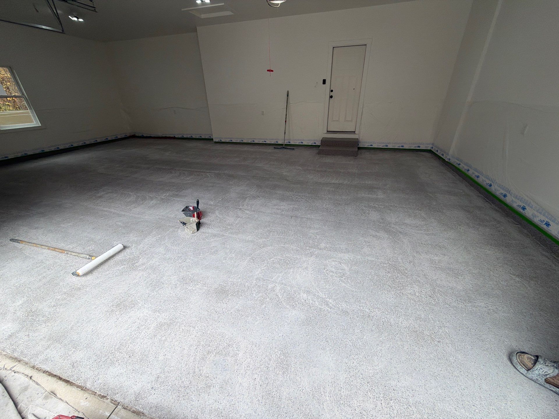 Hudsonville Garage Renovation Featuring Finished Drywall and Flake Epoxy Floors by Gordon Painting