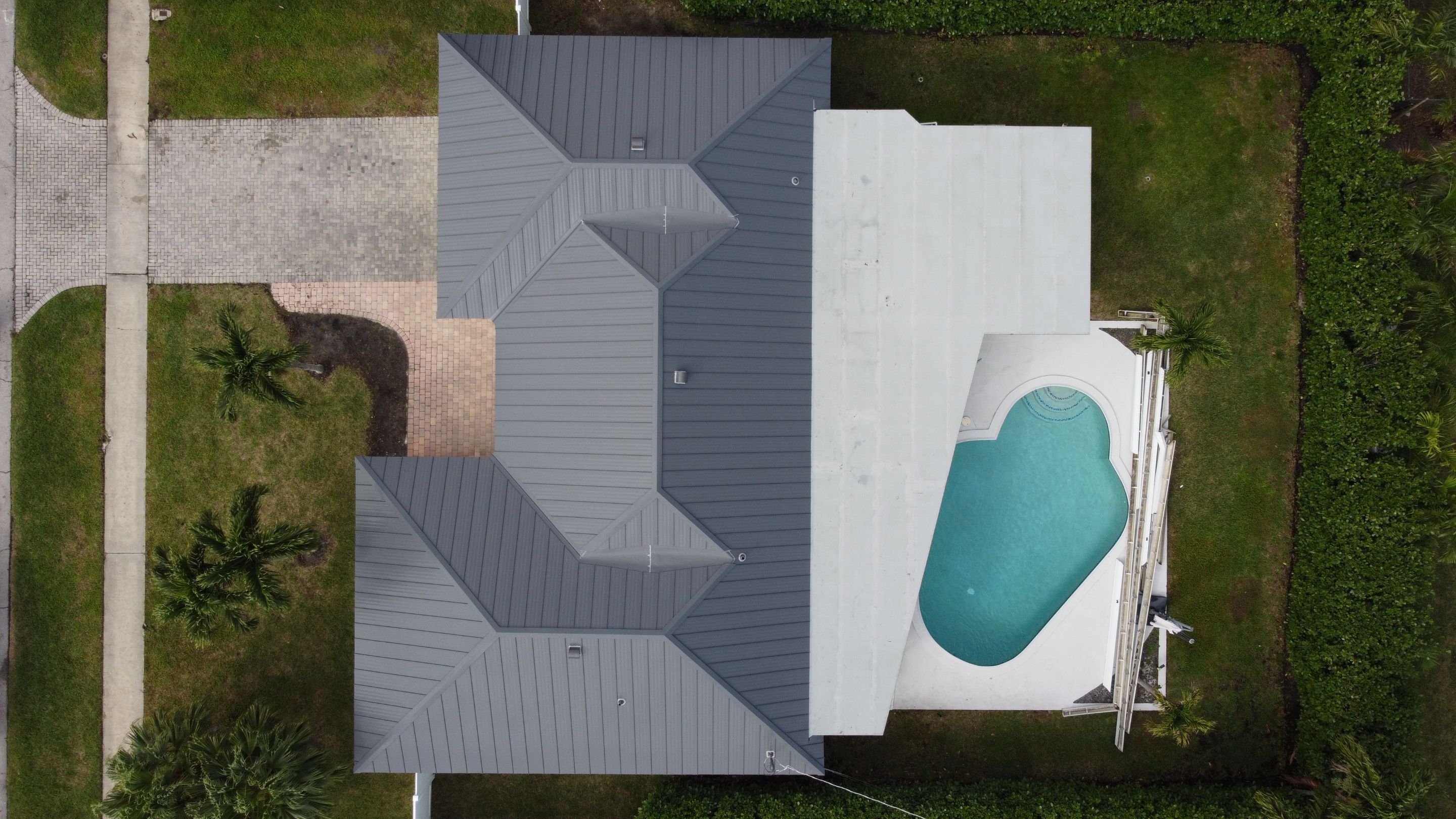 Residential Roofing Installation using 1" Nail strip metal roof by BLUES BROTHERS ROOFING