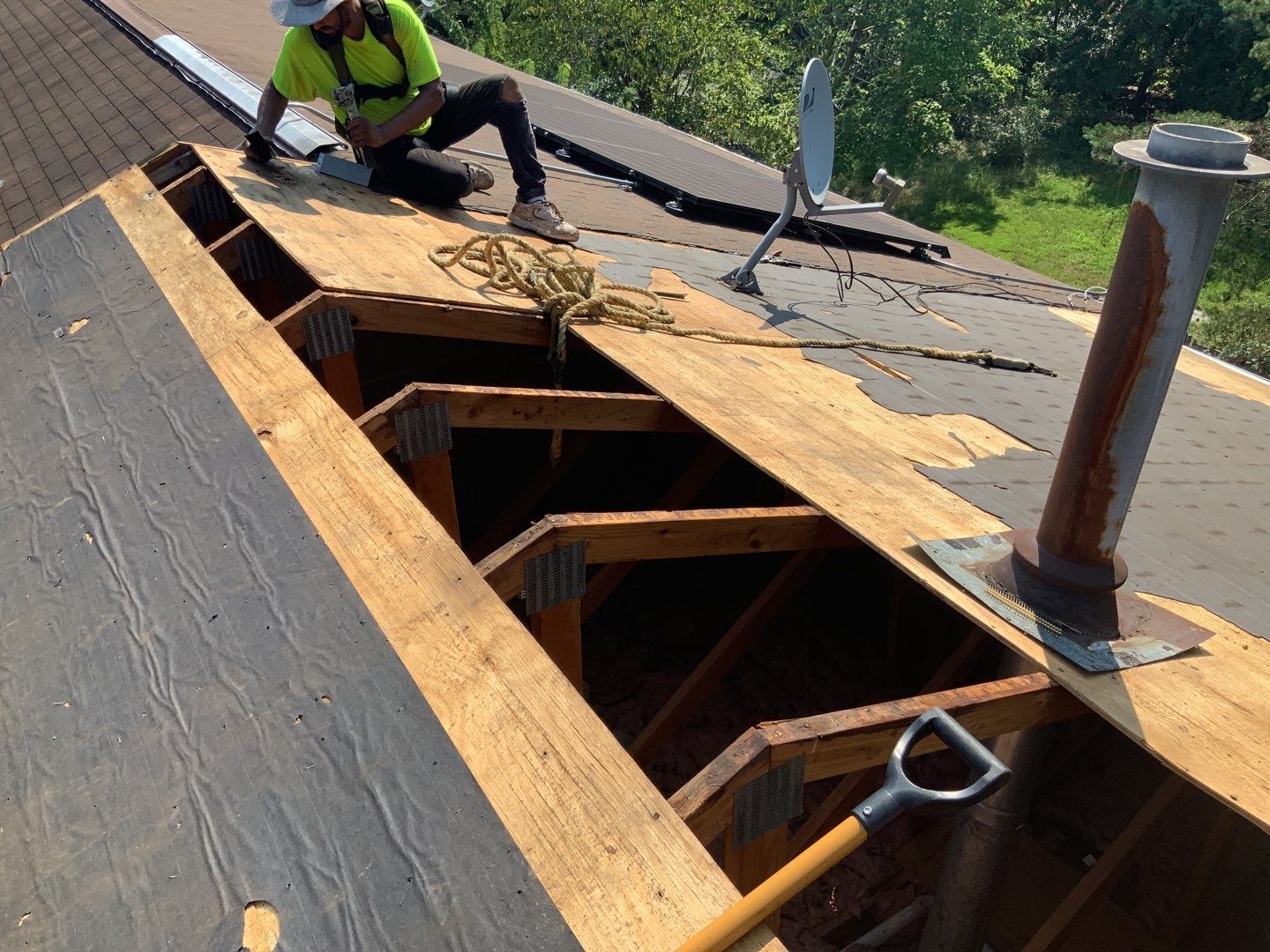 Residential Roofing Installation using Landmark Shingles Color Weatherwood by Alpha Design Services