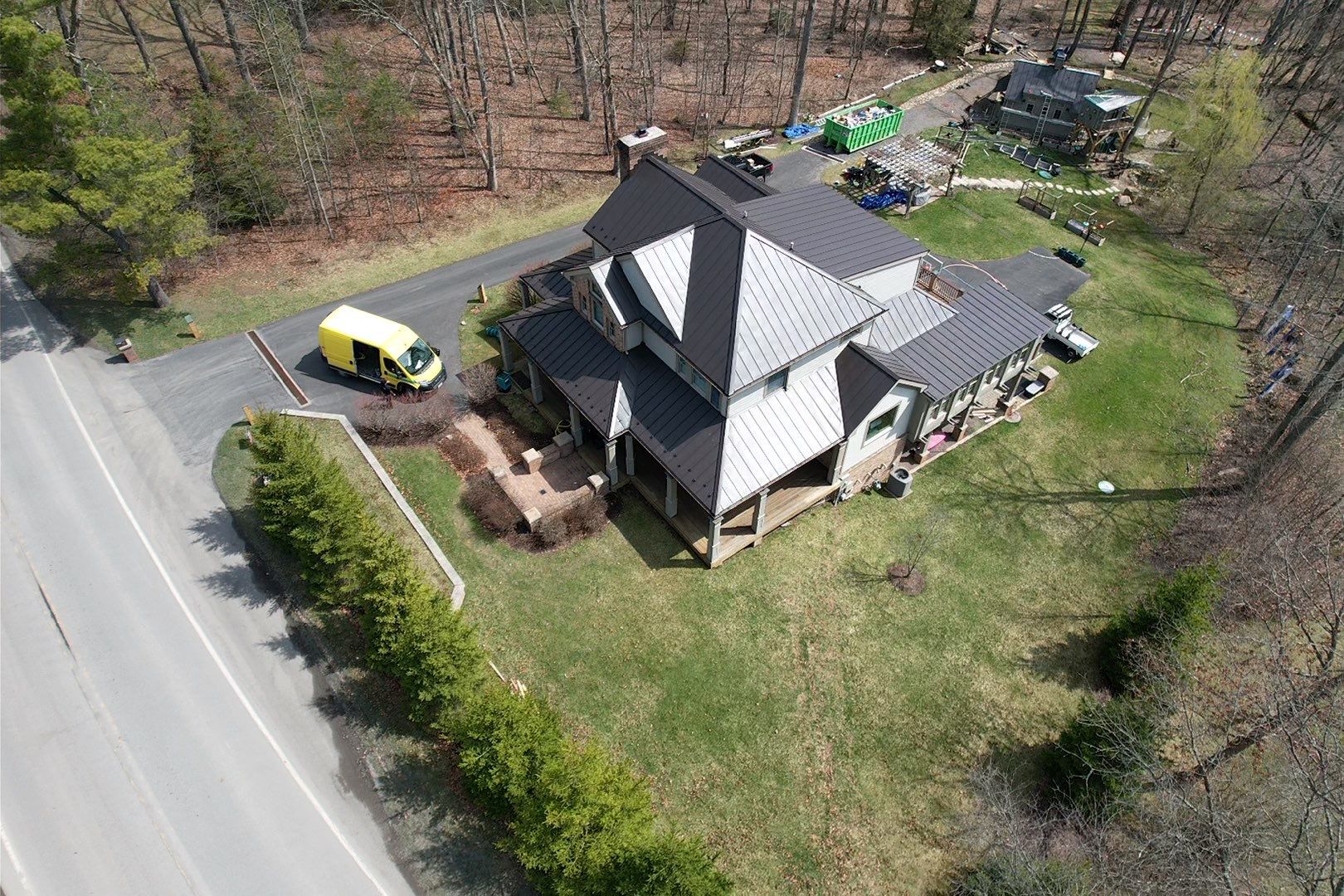 Metal Roof Replacement  by American Home Contractors