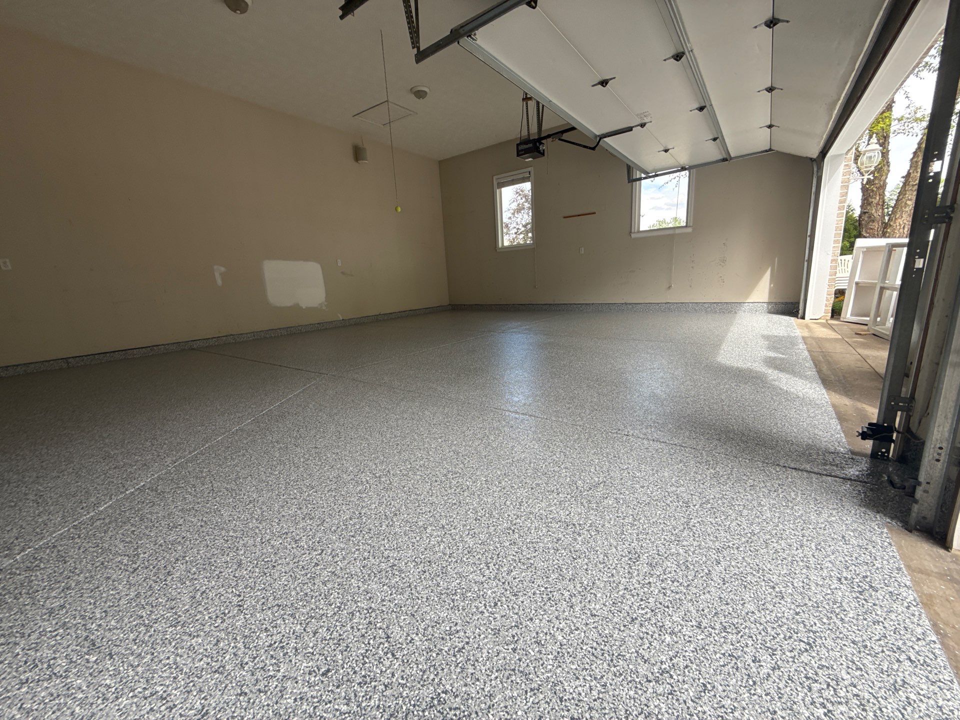 Gravel Garage Floor Coating by Level 10 Coatings