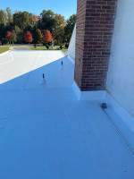 Roof Installation using Silicone TPO by ExteriorPros
