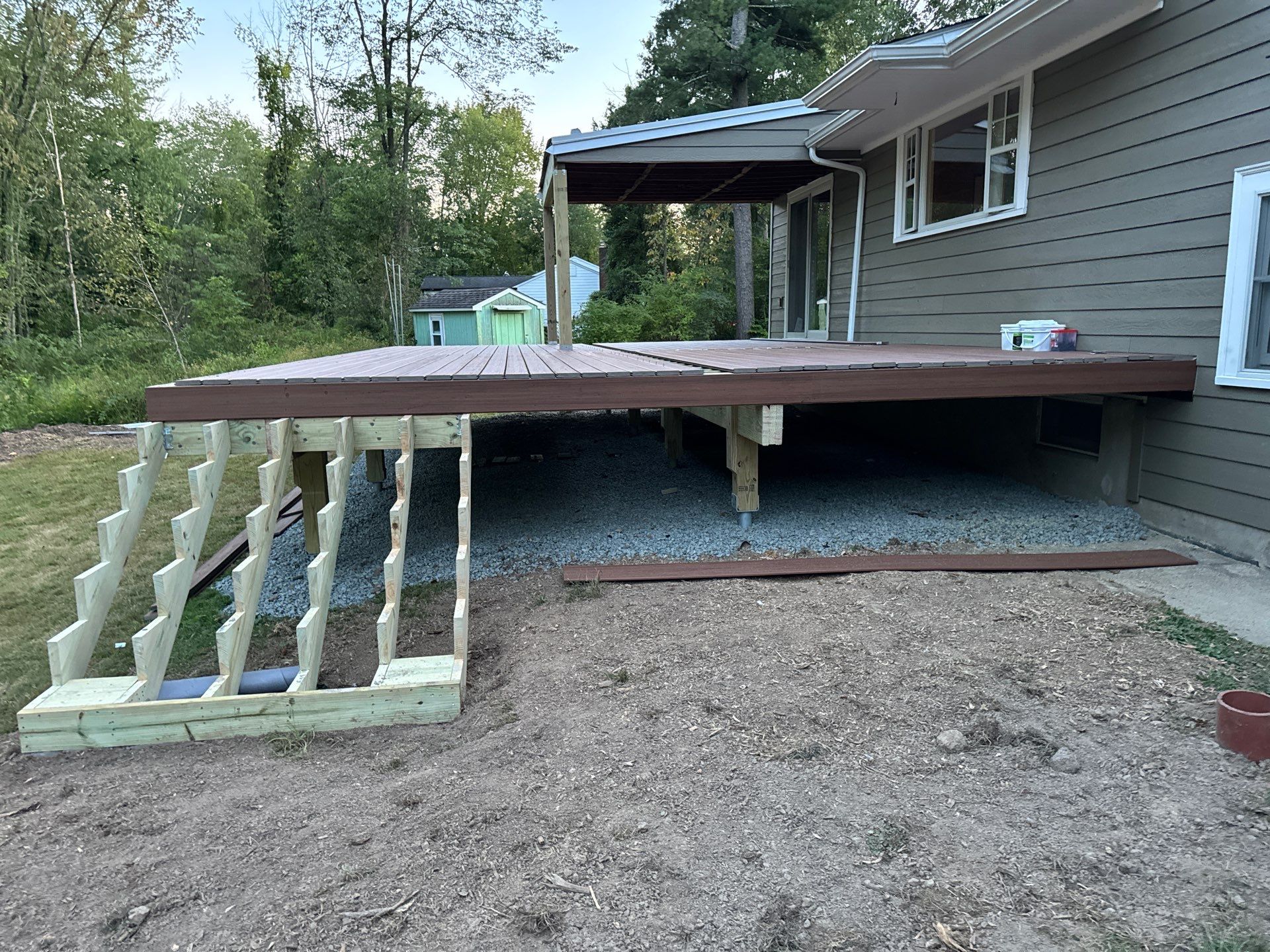 New Deck using Trex Tiki Torch  by deck guardian