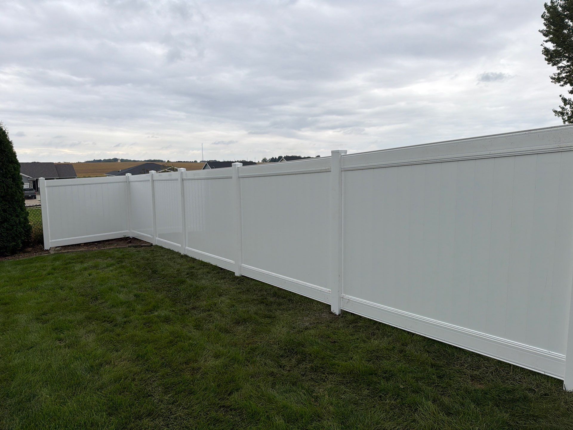 Residential Vinyl Privacy Fence Installation in Urbana by Perfect Picket Fence and Stain