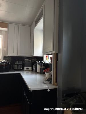 Two-Tone Kitchen Remodel with Black Subway Tile in Lincoln