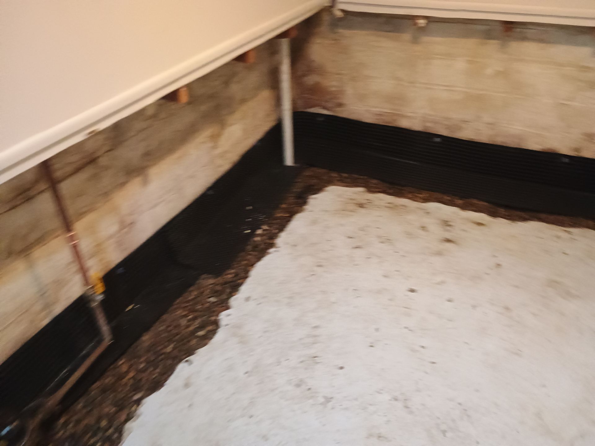 Interior Drain Tile & Sump Pump Installation in St. Paul, MN by Waterproofing Northeast