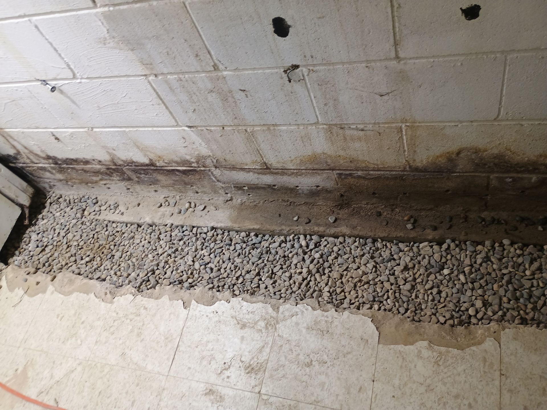 Interior Drain Tile Installation in Columbia Heights, MN by Waterproofing Northeast