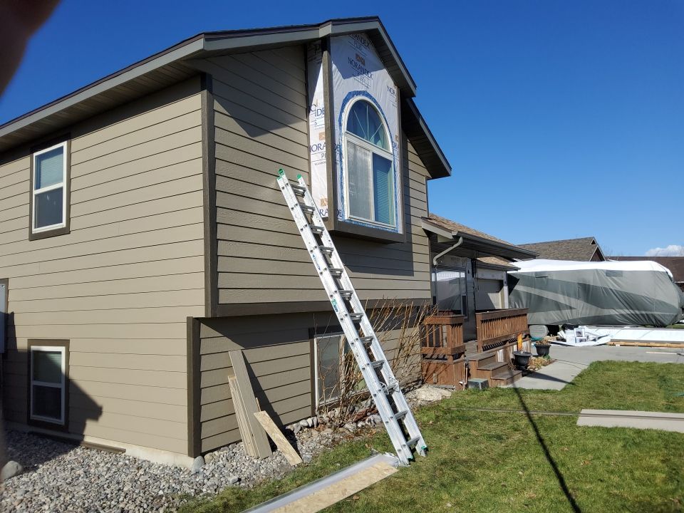 Residential Roofing Installation using LP Smart Siding in Bozeman, Montana by swagg construction