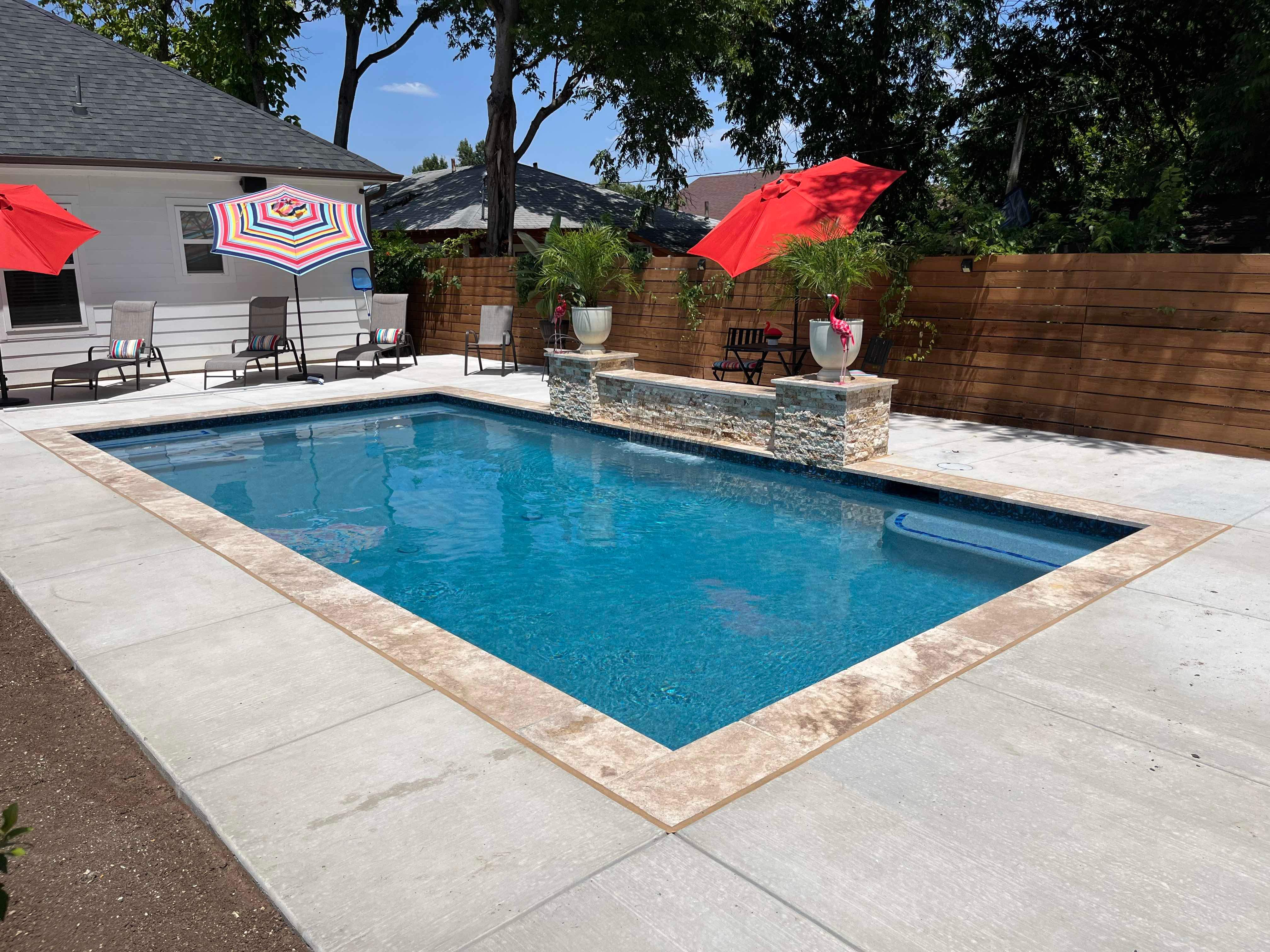 Geometric Pool with Tanning Ledge and Flagstone Decking by Pinnacle Pools and Spas - DFW
