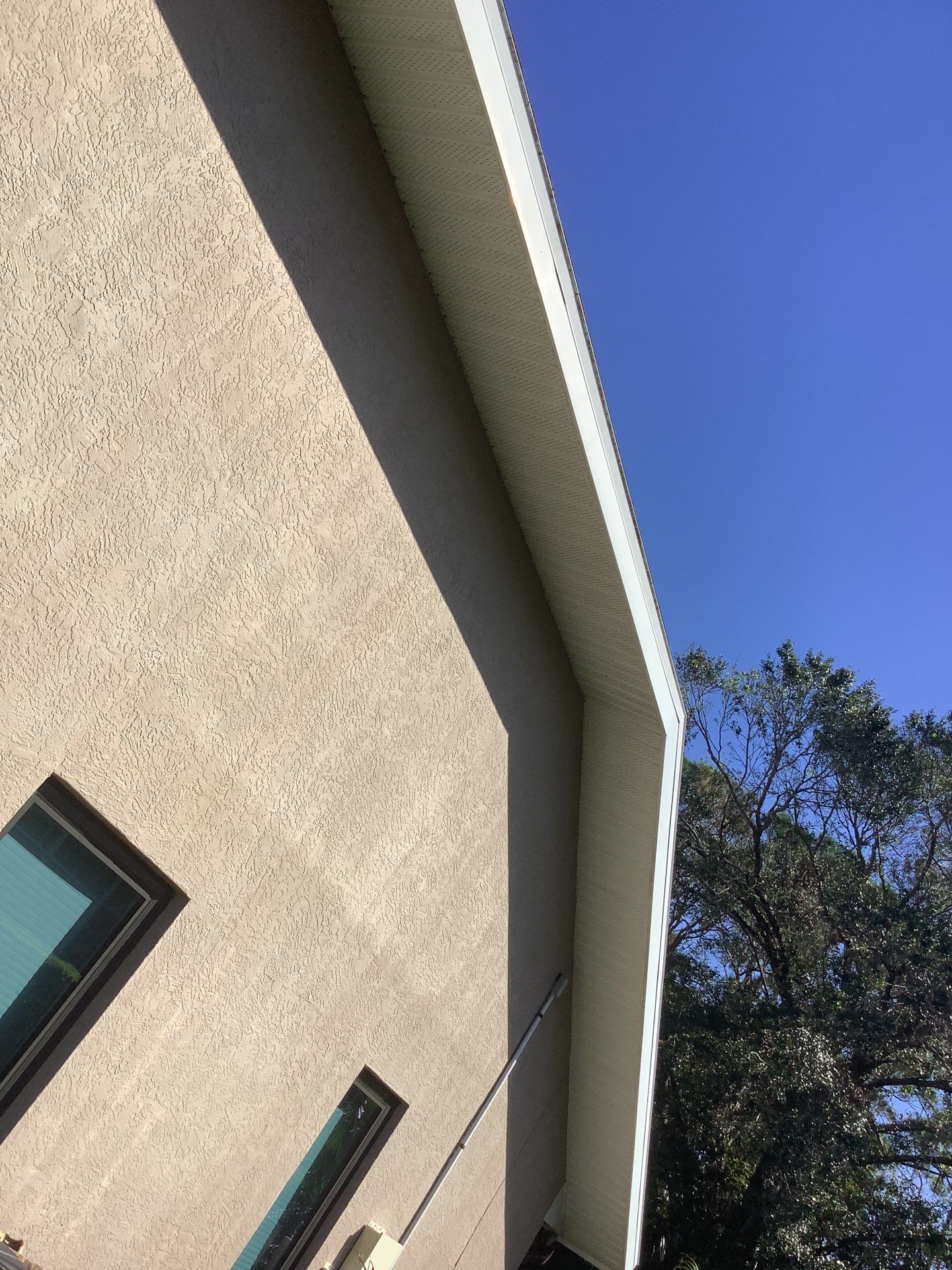 Black Seamless Gutters in Sarasota FL by Gutter Professors