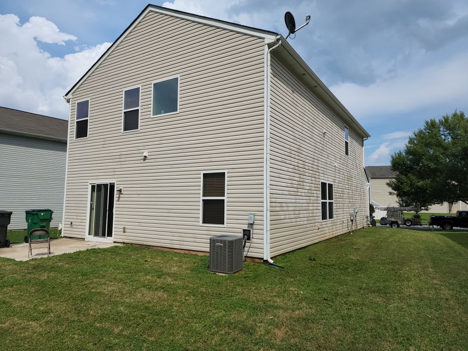 House Wash using cleaner by Power Wash Masters LLC