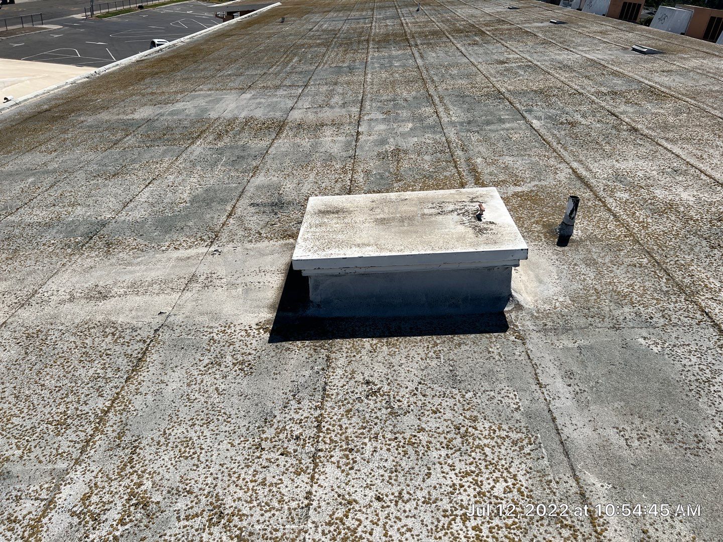 MR Roofing system using Benchmark/PUMA XL coatings over TPO single-ply roofing by Straight Edge Roofing Inc