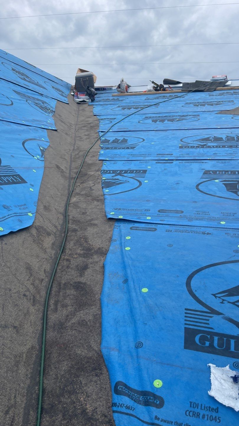 Commercial Roofing Installation using Roof Replacement by American Roofing & Construction LLC
