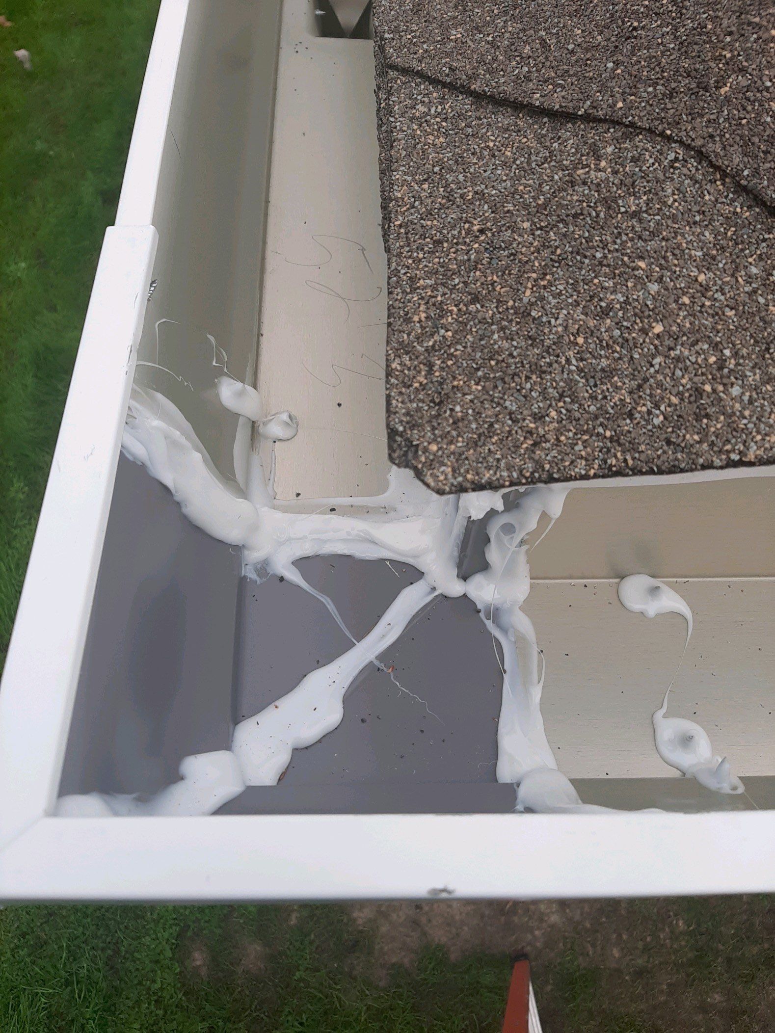 Gutter Installation Using White K-Style Seamless Gutters by Gutter Professors