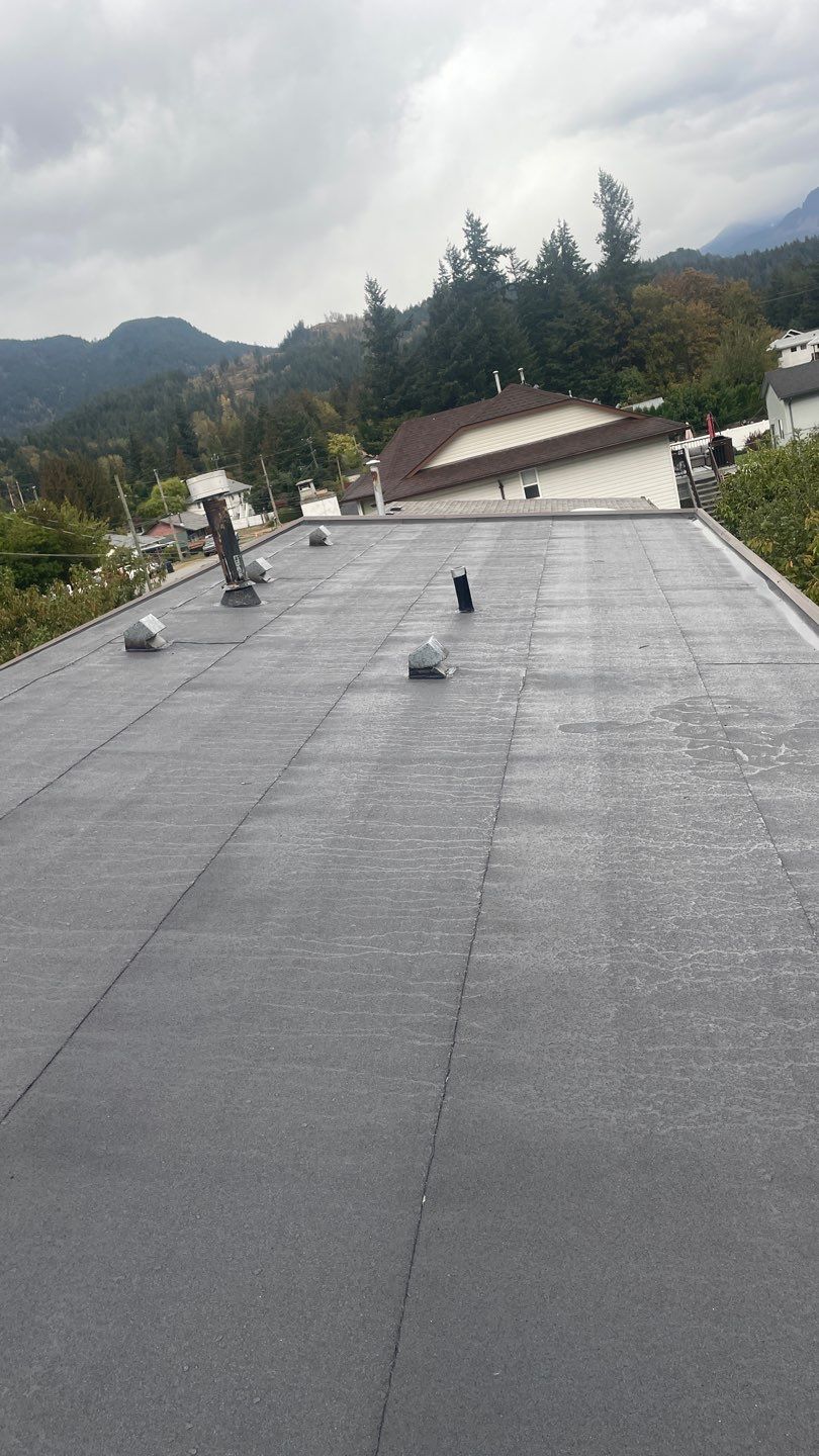 Residential ReRoofing Installation using IKO 2ply sbs  by Top Notch Roofing Inc