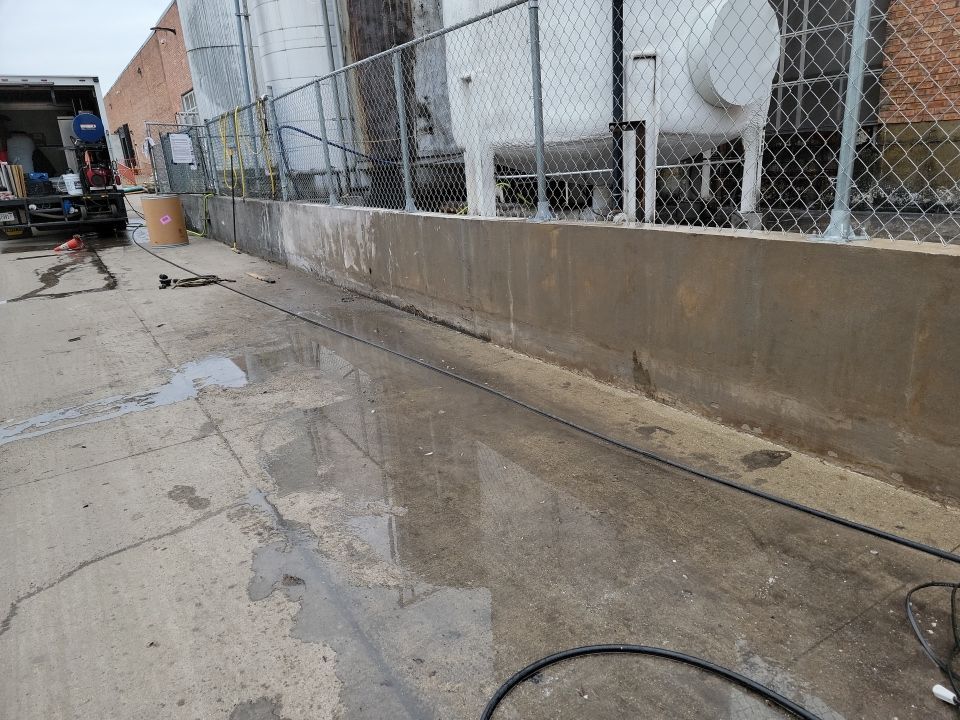 commercial pressure washing using Hot water by Northern Power Washing LLC.