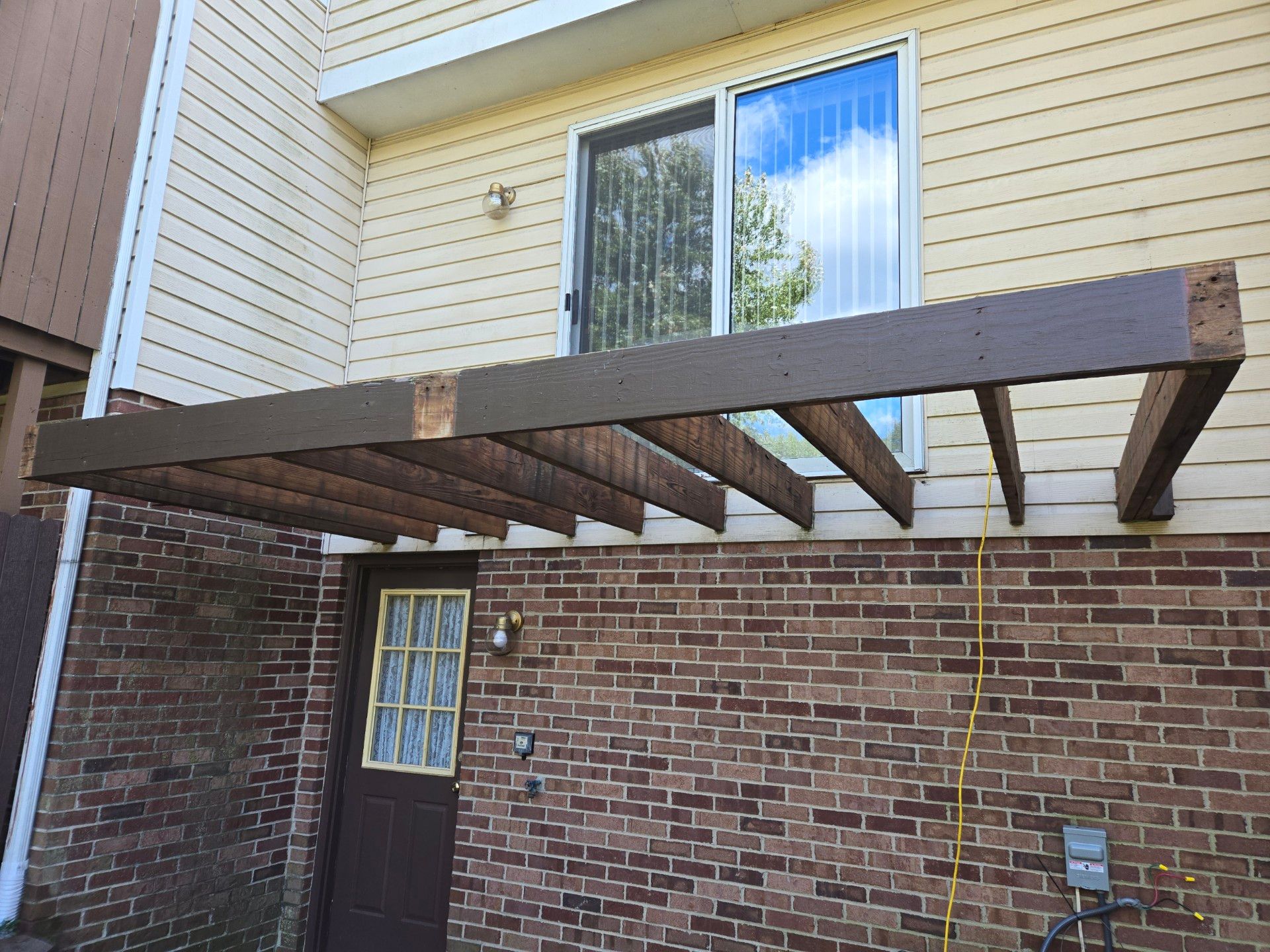 Stamped concrete and redeck  by Cousins Roofing Siding & Decks
